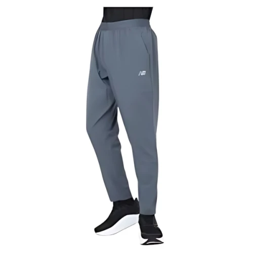 New Balance AC テーパードパンツ