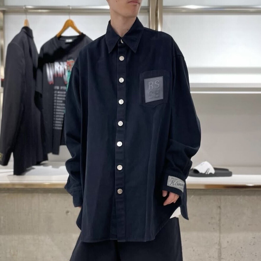RAF SIMONS •BIG FIT DENIM SHIRT WITH WOVEN LABEL ONSLEEVE