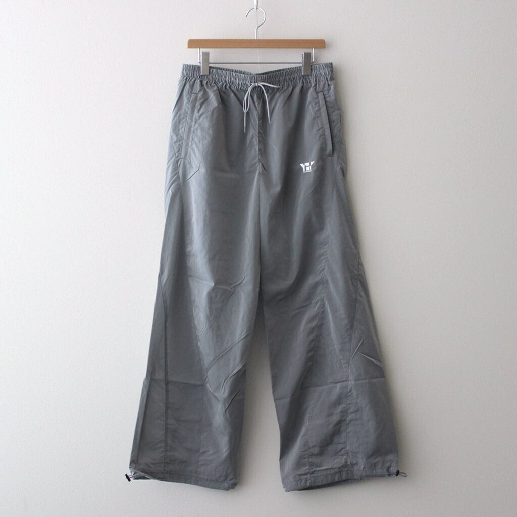 YUKI HASHIMOTO TWISTED NYLON TRUCK PANTS