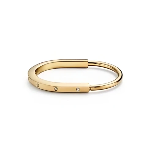 Tiffany & Co. バングル イエローゴールドにダイヤモンドのアクセント