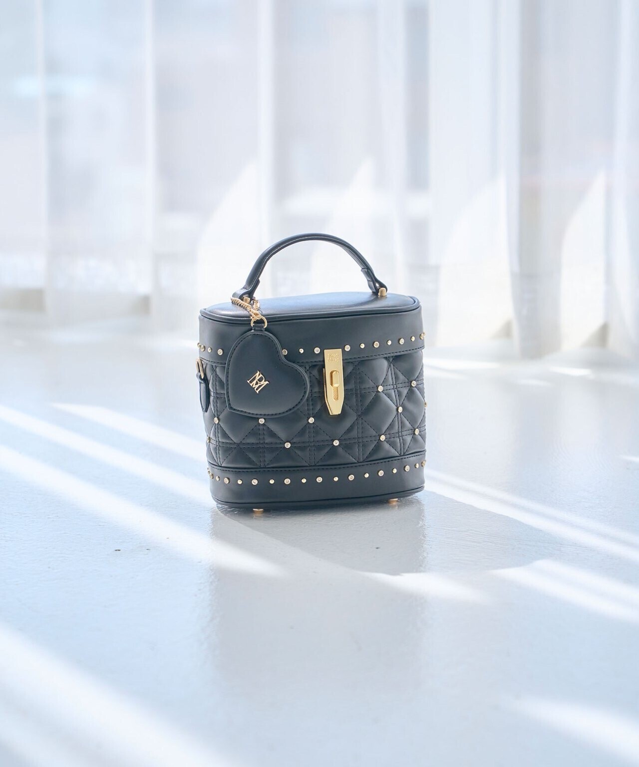 Rosé Muse vanity bag