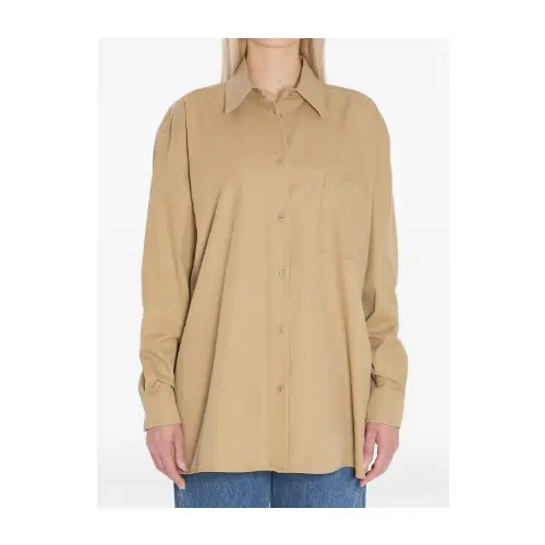 The Row buttoned pocketed shirt