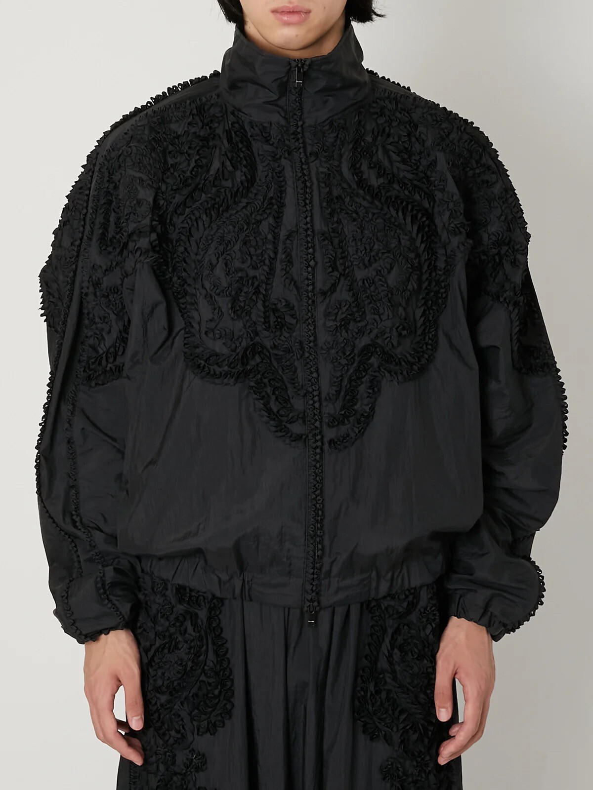TAAKK SCULPTURAL EMBROIDERY TRACK BLOUSON