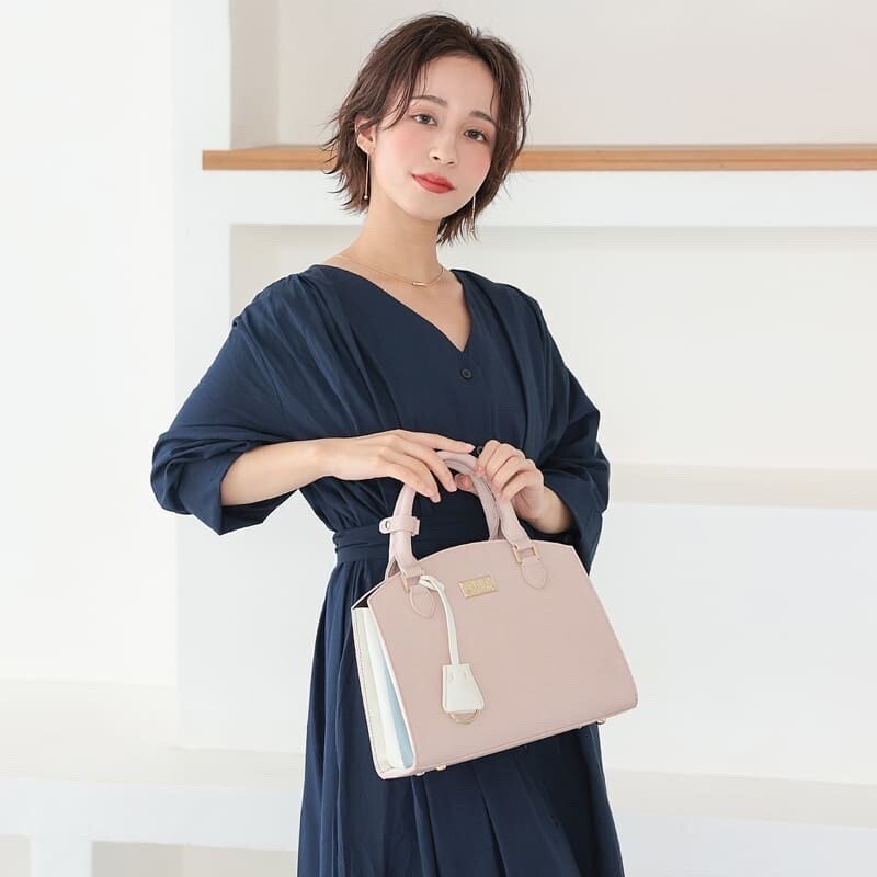 Clelia バイカラーショルダーバッグ